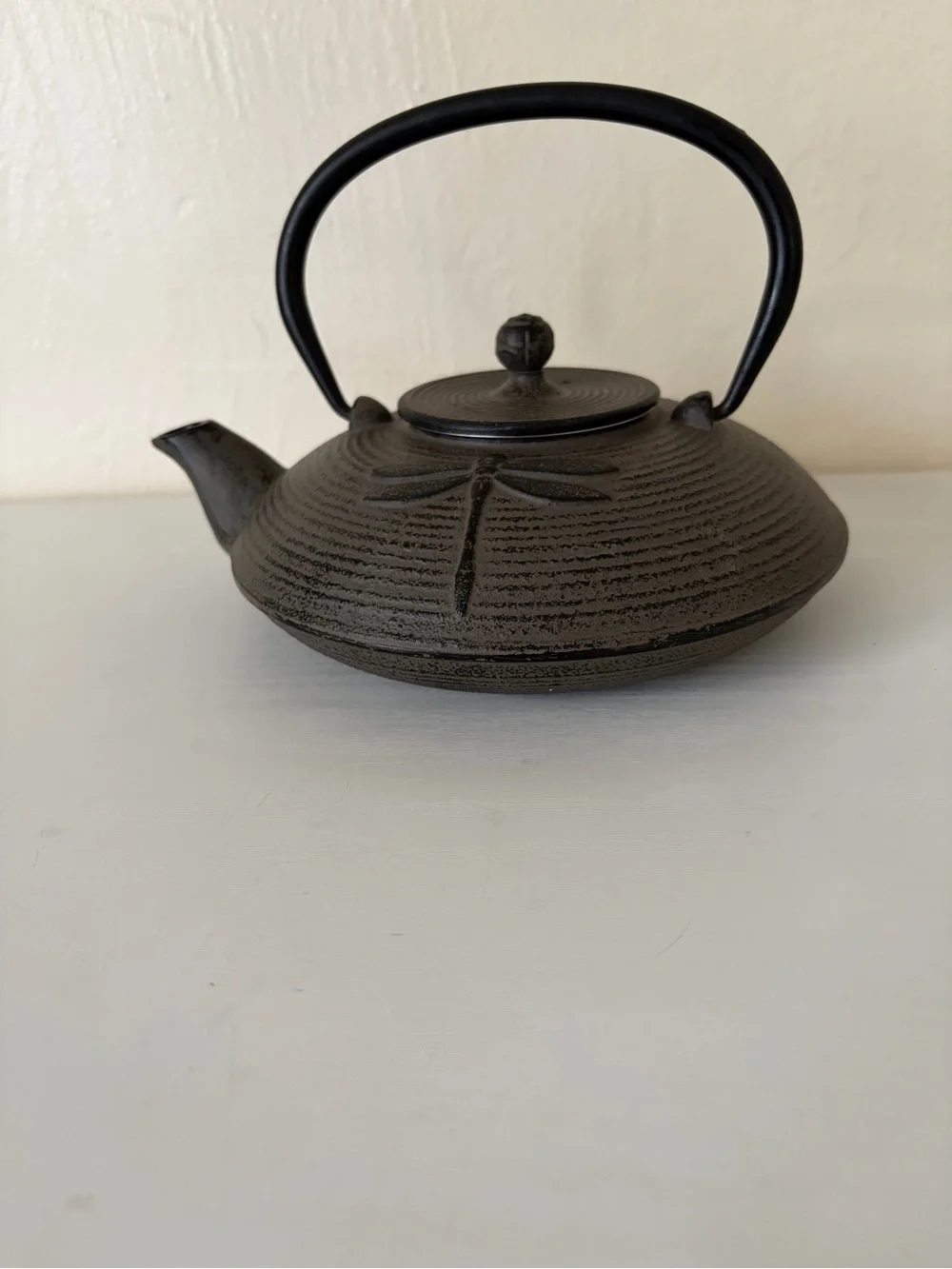 Black Cast Iron Dragonfly Motif Teapot with Curved Handle